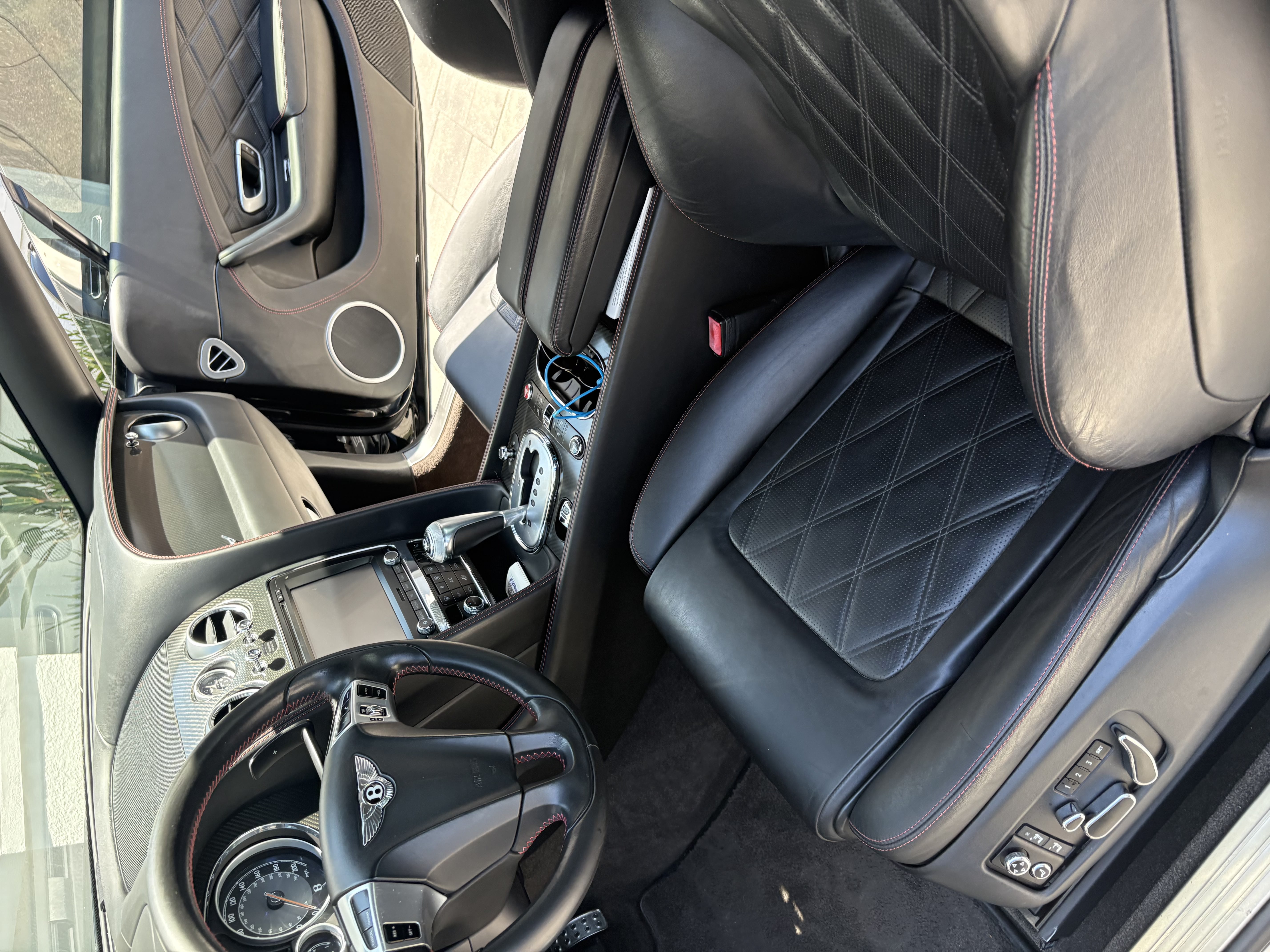 Bentley Continental interior with diamond-stitched leather after detailing
