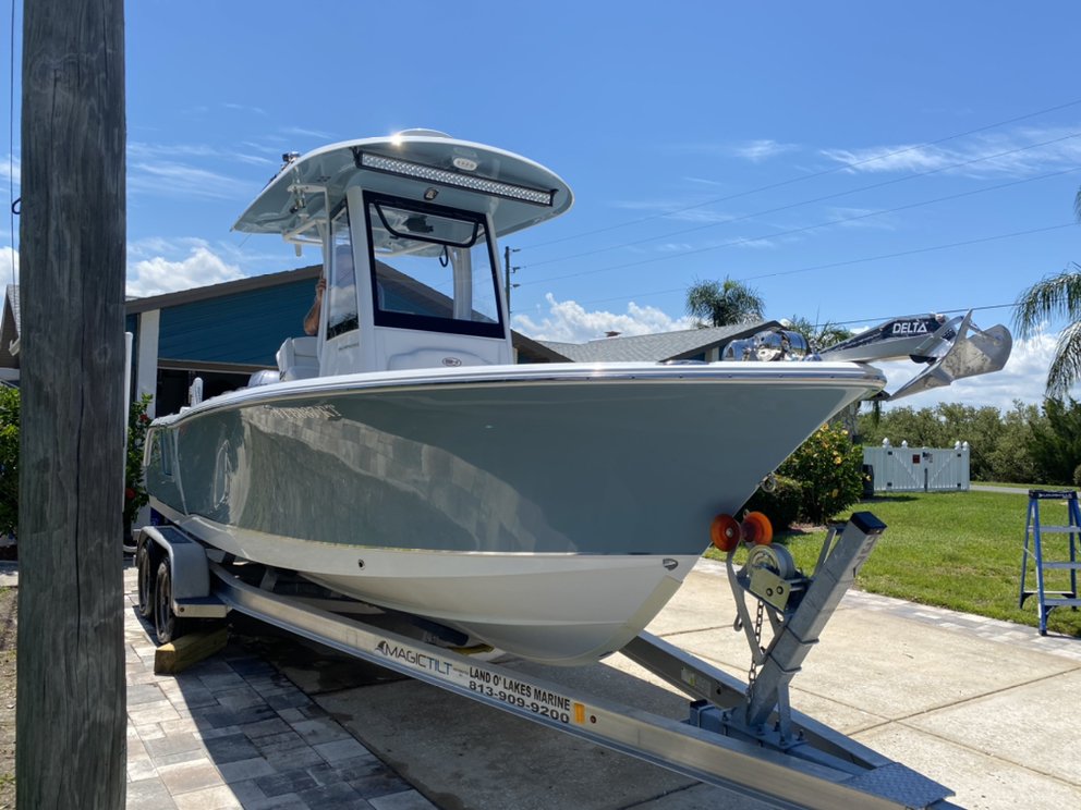 Sea Hunt center console boat gleaming after mobile boat detailing in Lake County, FL